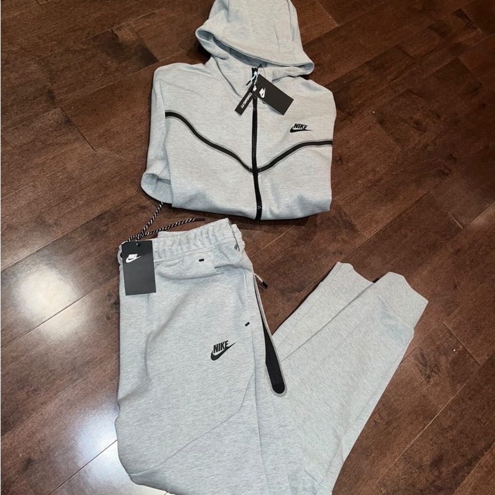 Brand new Nike tech fleece track suits.